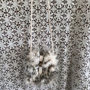Faux Fur Drawstring Crossbody Bag in Gray and White